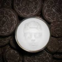 an oreo cookie surrounded by other oreo cookies